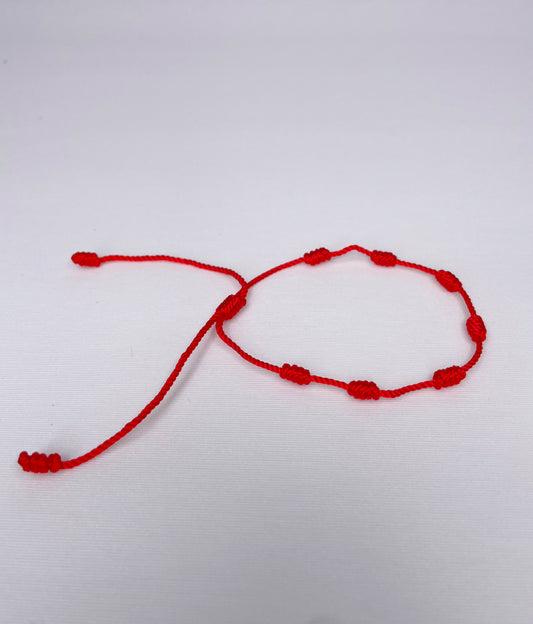 PULSERA ROJA DE SIETE NUDOS